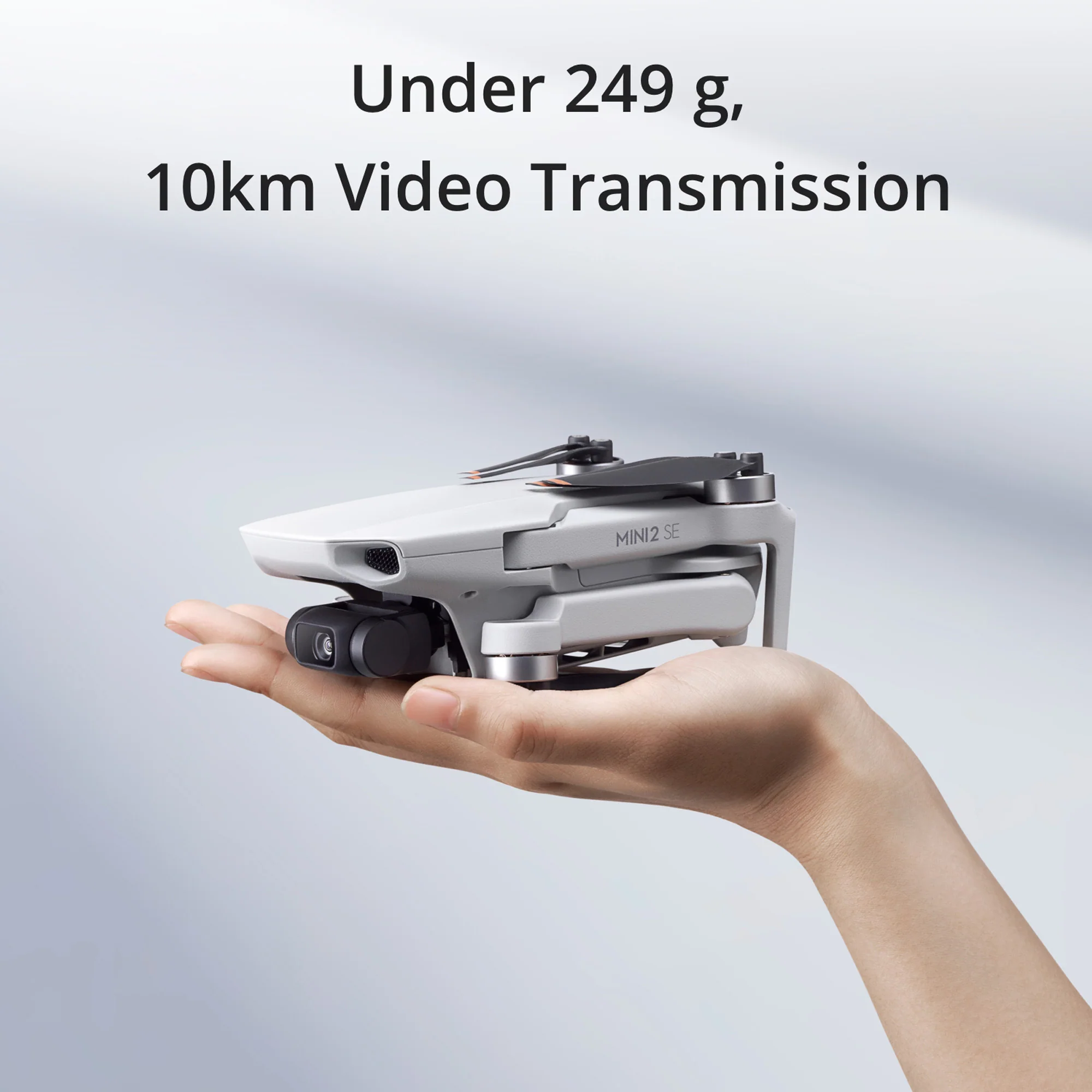 DJI Mini 2 SE Bundle with 64GB MicroSDXC Memory Card and 30-Inch Double-Sided Drone Landing Pad - Image 2